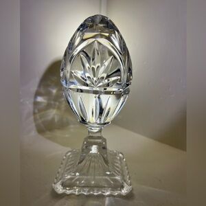 Crystal Egg on pedestal. Absolutely gorgeous!Picks up light beautifully 7 1/2”